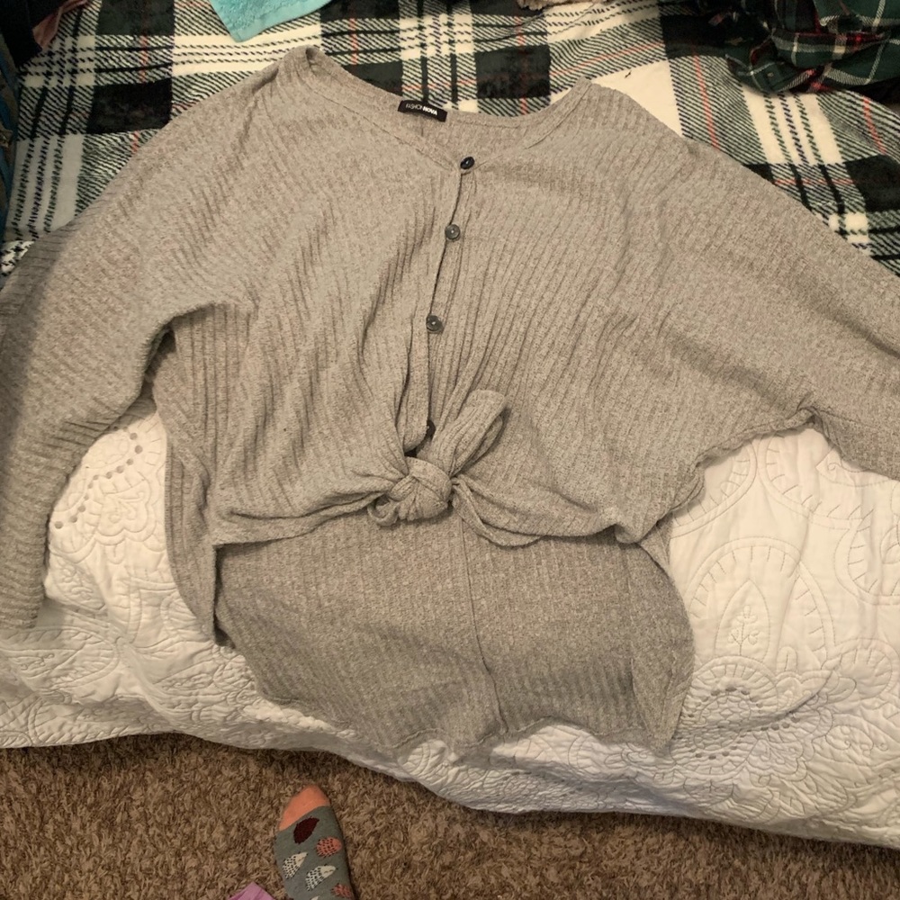 High/low tie sweater